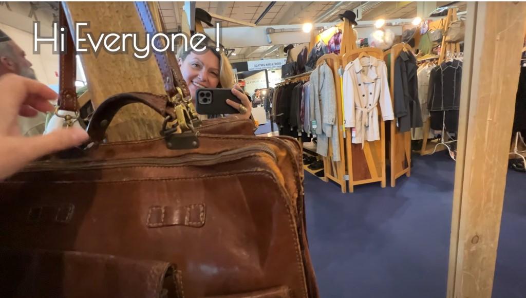 Young lady mirrored selfie in a antique fair