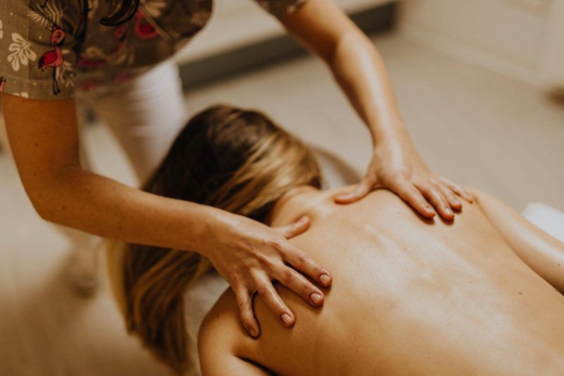 woman being massage in beauty spa