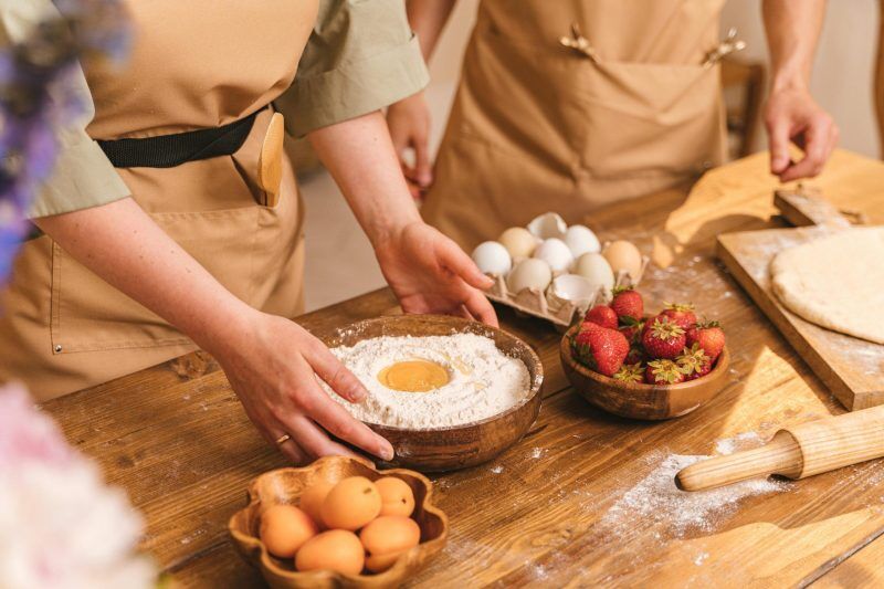 3 person are making a dough